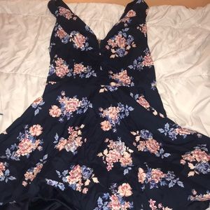 Short Navy dress with floral pattern.